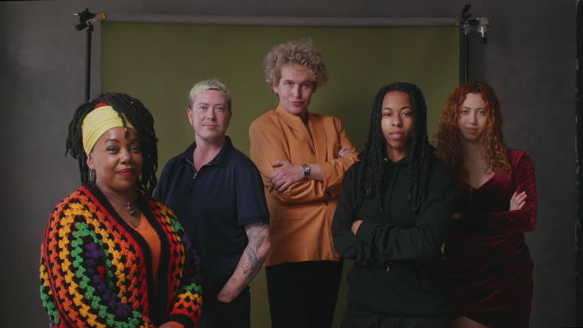 Five LGBTQIA queer people against studio backdrop Royalty-Free Stock Footage #1104148073