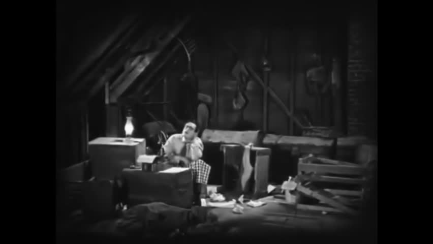 Circa 1924 - in this silent comedy, a writer is working on his manuscript. the next scene shows an enactment of a book chapter.