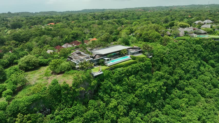 Bali - circa 2023 - excellent aerial footage of a resort with a swimming pool in uluwatu, bali.