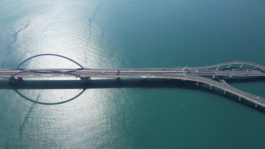 Large-scale sea traffic viaduct bridge Cross Bay Link landmark at sea in Lohas Park,Tseung Kwan O of Hong Kong city, Kowloon Kai Tak Aerial Top view Royalty-Free Stock Footage #1104166221