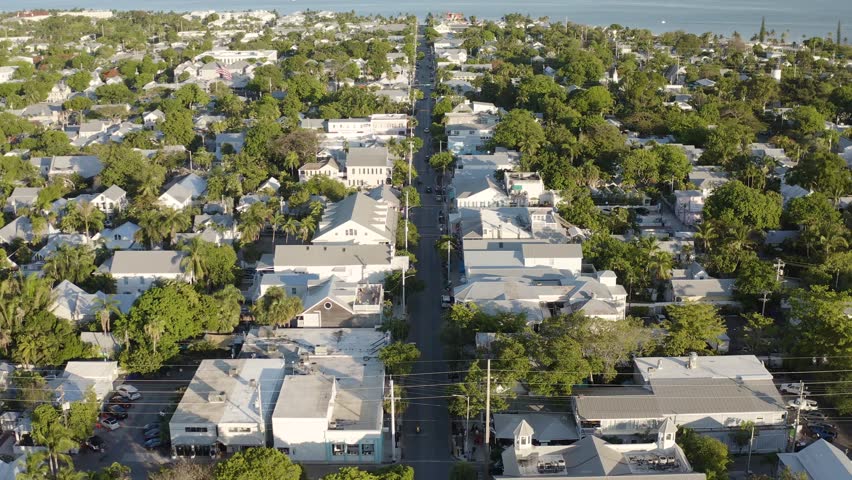Aerial view of Duval Street in Key West, Florida landscape cityscape with houses and local businesses in the Florida Keys - 4K Drone