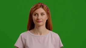 Beautiful young woman using interactive touch screen with various gestures isolated green screen background. Casual woman using touch screen moving fingers. - Powered by Shutterstock - Get 15% off with code: PIKWIZARD15