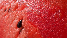 Macro video of watermelon using a probe lens. Captivating close-ups showcase its vibrant red flesh, glistening with juiciness. Revealing the refreshing and delicious fruit. fruit concept. 4K

