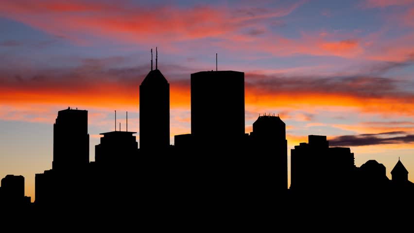 Downtown Indianapolis Skyline at Twilight, Time Lapse with Colourful Sky and Dark Silhouette of Skyscrapers, USA