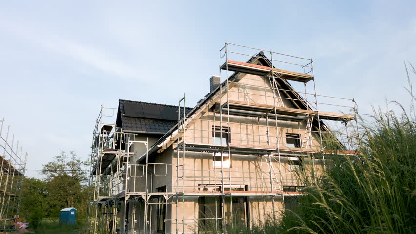 Crane shot of a German single family house under construction Royalty-Free Stock Footage #1104204219