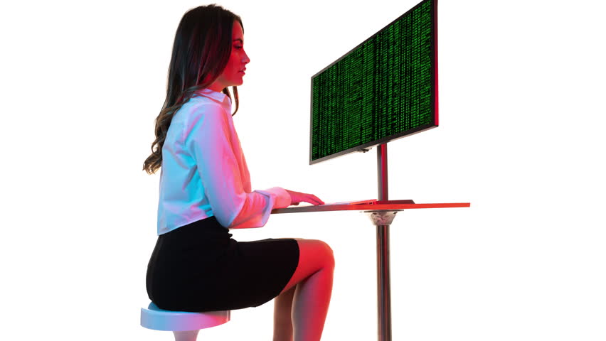 A smart woman on a computer with code on the screen