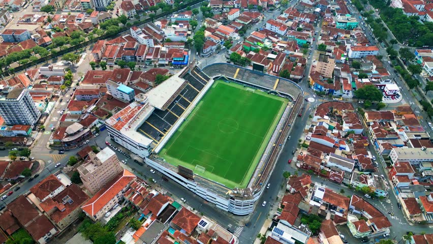 Aerial rotate shot of Vila Belmiro Stadium. Panoramic landscape of famous football stadium at city of Santos, state of Sao Paulo, Brazil formally called Urbano Caldeira Stadium. 
