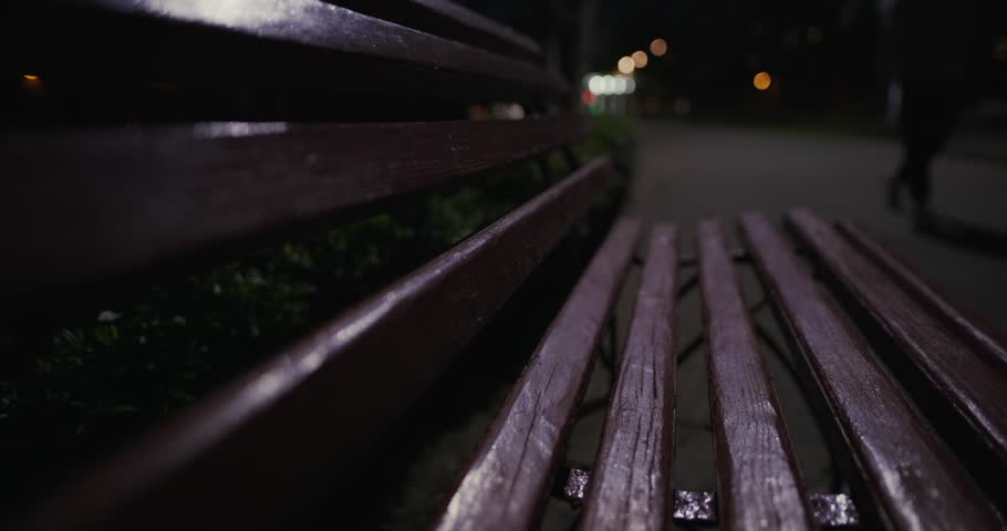 Silence at the night park - bench closeup, contains original audio Royalty-Free Stock Footage #1104225443