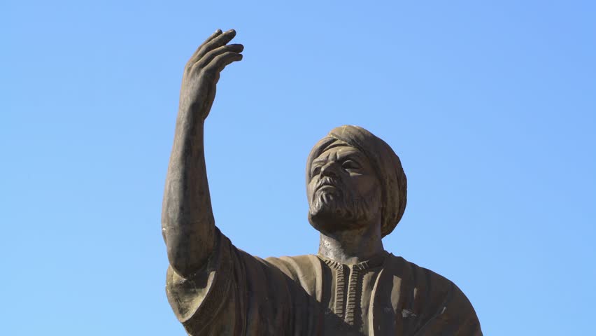 Al-Mutanabbi statue with blue sky for copy space in background, Baghdad in Iraq. Low angle