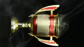 vertical video of gold cup smoke  - Powered by Shutterstock - Get 15% off with code: PIKWIZARD15