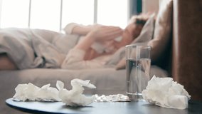 Unhealthy sick ill Caucasian woman sneeze in bed at home bad feeling coronavirus cold flu disease girl suffer headache fever seasonal virus allergy blowing runny nose in tissue napkin health problem - Powered by Shutterstock - Get 15% off with code: PIKWIZARD15