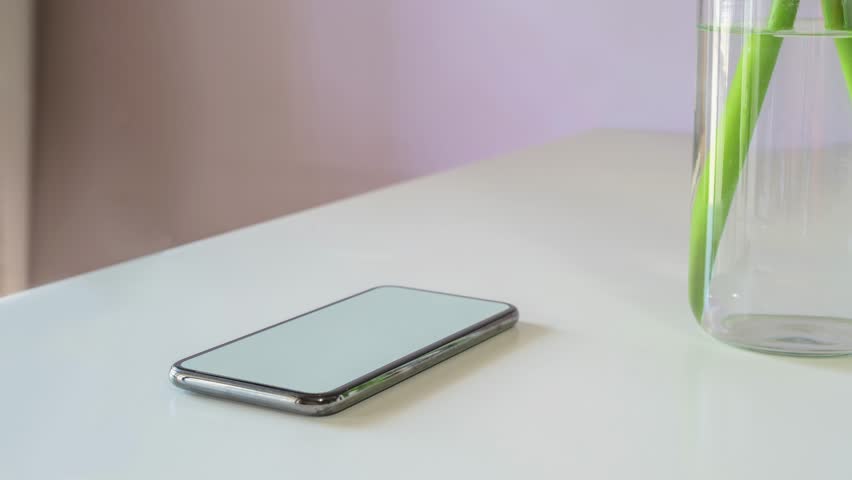 One Message Notification on Smartphone Screen At Home Table. New Business Email Alert Sign Pop up From Mobile Phone. Close up Royalty-Free Stock Footage #1104239569