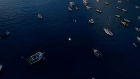 Animation of connected icons over aerial view of boats in ocean. Digital composite, multiple exposure, communication, report, business, transportation, drone and technology concept. - Powered by Shutterstock - Get 15% off with code: PIKWIZARD15