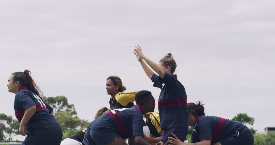 Rugby, fitness and women with a ball, exercise and training with wellness, healthy and cardio. Female people, players and athletes on the field, workout goal and challenge with a match and teamwork Royalty-Free Stock Footage #1104246063