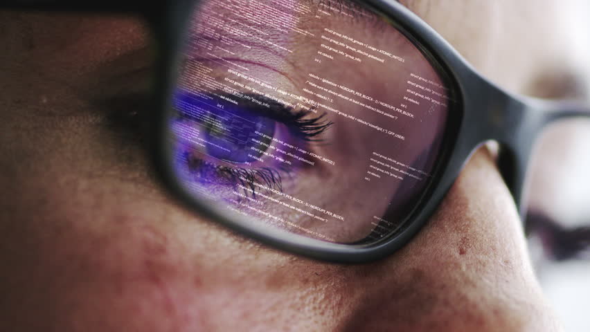 Woman, glasses and code reflection of a person looking at software and computer data. Eyes, glass and closeup with coding and digital biometric tech vision with a female person checking tech Royalty-Free Stock Footage #1104246125