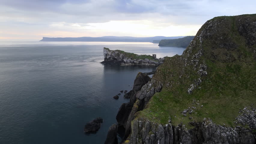 Northern Ireland aerial view of coastline with Kinbane Castle Royalty-Free Stock Footage #1104246483