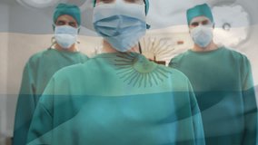 Animation of waving argentina flag against team of diverse surgeons standing together at hospital. National medical healthcare technology concept - Powered by Shutterstock - Get 15% off with code: PIKWIZARD15