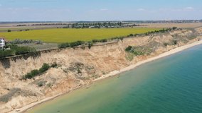 Panorama of sea shore in South Ukraine, Europe. Resort city with nice sand beach and clear blue sea. travel destination, ideal place for comfort vacation on black Sea. Drone video.