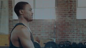Animation of scope and data processing over african american man exercising. Global sports, computing and data processing concept digitally generated video.
