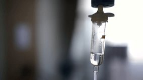 Close up saline IV drip for patient and Infusion pump in hospital. - Powered by Shutterstock - Get 15% off with code: PIKWIZARD15