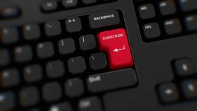 Subscribe button on keyboard. A finger presses Enter. Click SUBSCRIBE. Realistic keyboard button. Red button Subscribe to push. Set for action. Office keyboard with unique word to press. Close up - Powered by Shutterstock - Get 15% off with code: PIKWIZARD15