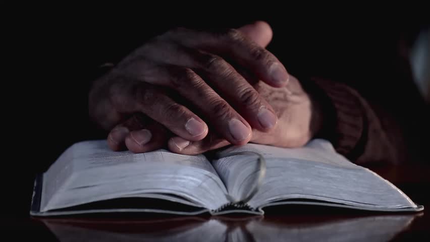 praying to God with hand on bible with people stock video stock footage Royalty-Free Stock Footage #1104277157