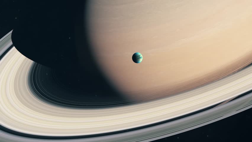 Approaching Saturn and it's Largest Moon Titan | Shutterstock HD Video #1104277283