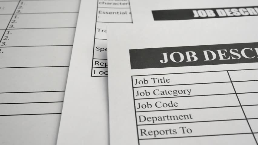 A panning shot of job description forms and paperwork. The concepts of job requirements, responsibilities, work skills, human resources, recruitment and startup business. Royalty-Free Stock Footage #1104286599