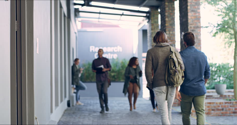 Lost, looking and a student on campus for class, education and walking to classroom. Confused, new and young man in search of a lecture hall for studying and learning at college or university