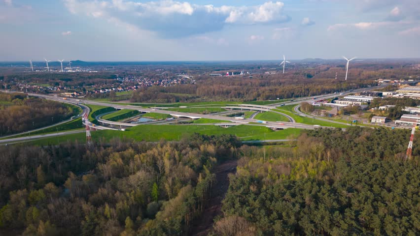Urban cityscape and majestic highway junction in Belgium, aerial view