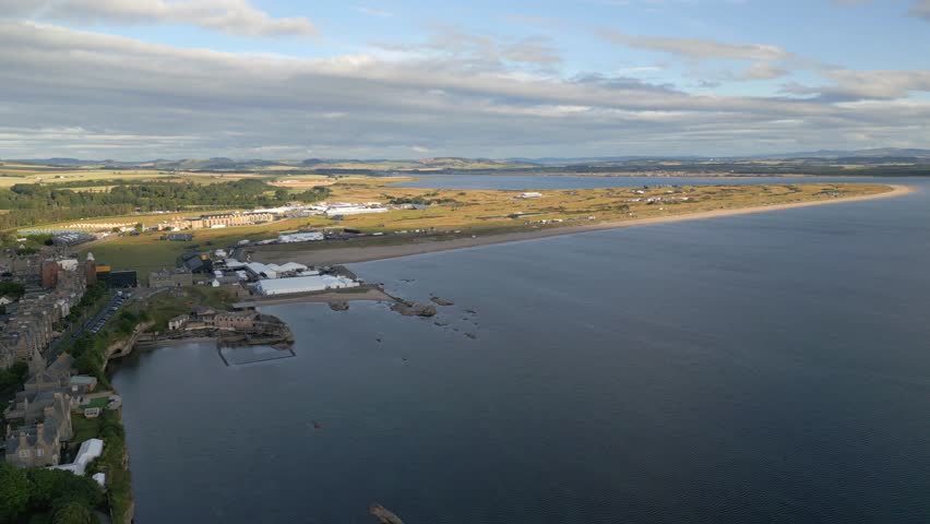 Generic aerial view of the St Andrews coastline in Scotland with sea, coast and golf course area Royalty-Free Stock Footage #1104294821