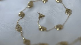 Gold Thread Embroidery On White Fabric - Powered by Shutterstock - Get 15% off with code: PIKWIZARD15