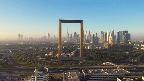 Aerial view of Dubai frame landmark during the sunset, Dubai, U.A.E Stockvideó