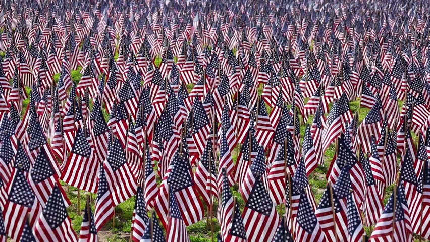 37,000 US flags planted in Boston Common, to commemorate fallen soldiers in wars, during Memorial Day weekend Royalty-Free Stock Footage #1104300535