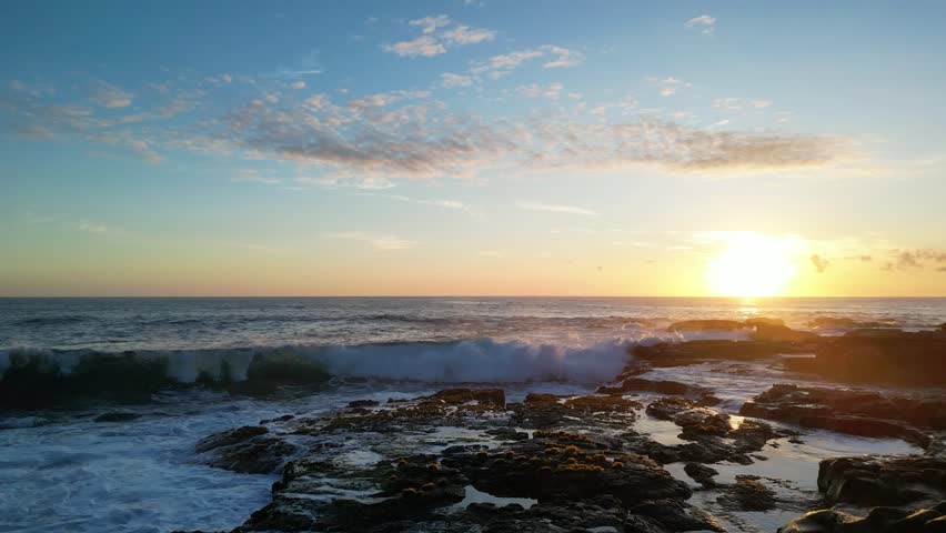 Ocean sunrise in Hawaii. Waves crashing on the beach | Shutterstock HD Video #1104304739