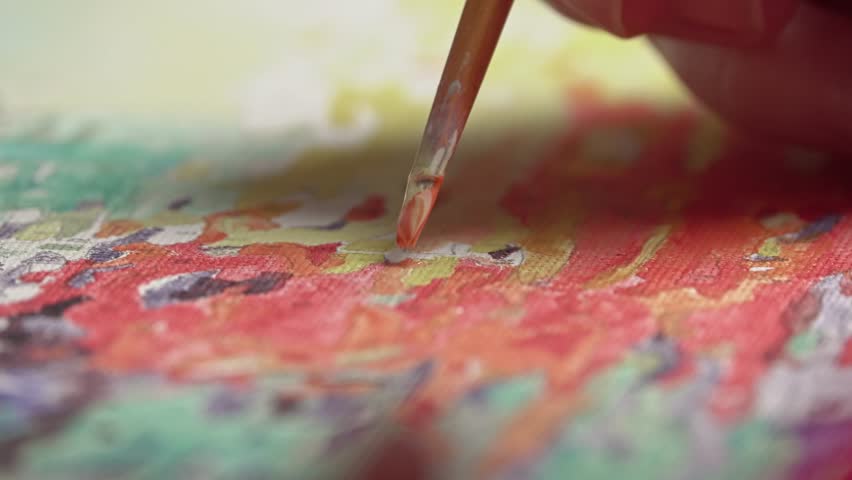 Paint by numbers close up. Female hand with brush drawing. Active leisure at home, creative hobby concept. Numbered paints. Painting by numbers process. Selective focus on paintbrush. Royalty-Free Stock Footage #1104310491