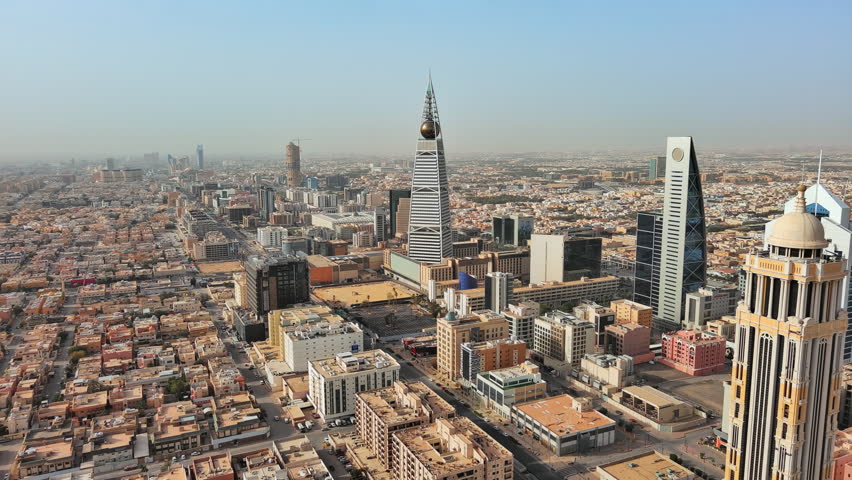 Riyadh: Aerial view of capital city of Saudi Arabia, modern city skyline, Al Olaya financial district with skyscrapers - landscape panorama of Arabian Peninsula from above Royalty-Free Stock Footage #1104319929