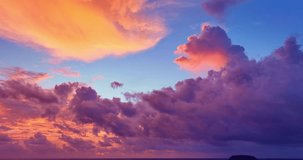 aerial view Scene of Colorful romantic sky The brilliant colorful cloud.
beautiful sky at sunset above island in nature and travel concept.
Gradient color. amazing colorful cloud scape background