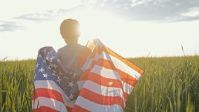 Cute little boy - American patriot kid running with national flag in green field. USA, 4th of July - Independence day, celebration. US banner, memorial Veterans, election, America, labor - Powered by Shutterstock - Get 15% off with code: PIKWIZARD15