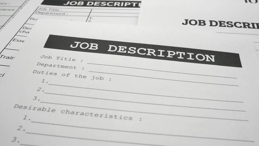 A tracking shot of job description forms and paperwork. The concepts of outsourcing, job requirements, work skills, human resources, recruitment and startup business. Royalty-Free Stock Footage #1104327909