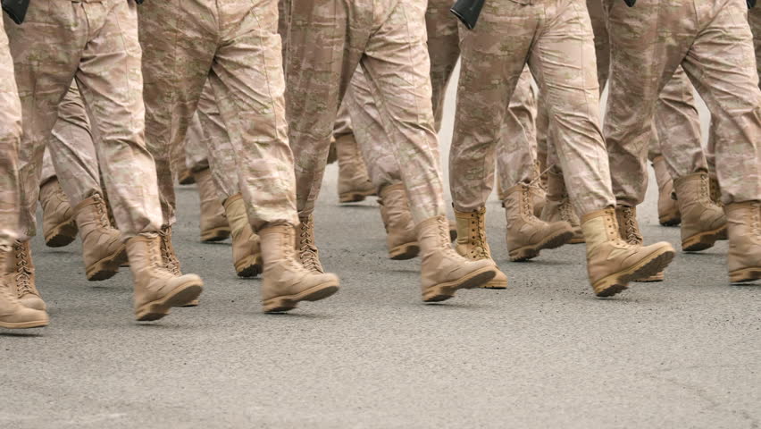 Military boots close up. Lot armed soldier walk slow motion. Male war team. Army platoon step. Many officers march. Men combat troop. Hot spot fight. Nation military forces. Sand desert shoe uniform. | Shutterstock HD Video #1104327989