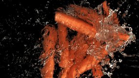 Carrot falls into the water. Filmed is slow motion 1000 fps. High quality FullHD footage - Powered by Shutterstock - Get 15% off with code: PIKWIZARD15