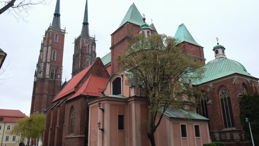Wroclaw central market square with old houses. Historical capital of Silesia, Europe. City hall architecture buildings. Old town landmark cathedrals church