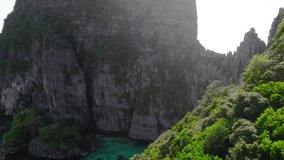 Aerial video flying back over the cliff of Koh Phi Phi Lee Thailand