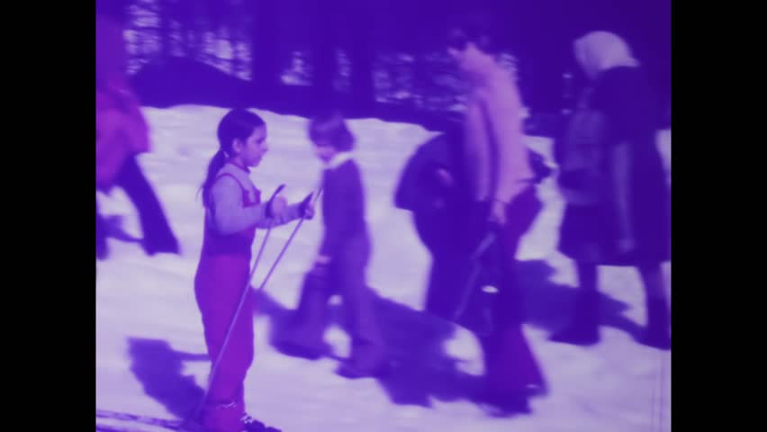 Rome,Italy may 1975: Relive cherished family moments on the snowy slopes with this vintage video clip capturing 70s ski adventures.