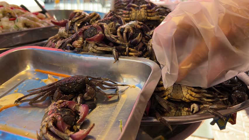 Customer chosen  pickled crab is used for adding in papaya salad.