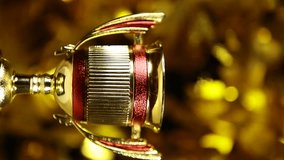 vertical video of blur gold cup - Powered by Shutterstock - Get 15% off with code: PIKWIZARD15