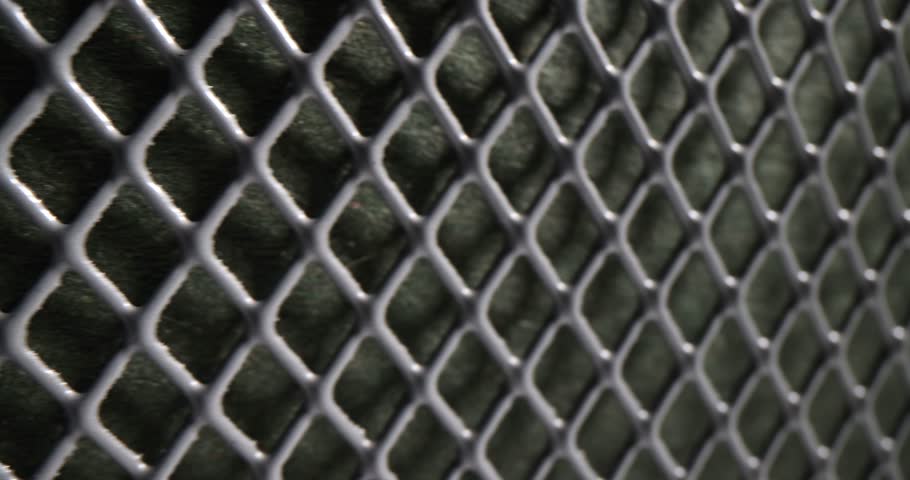 Grey perforated metal mesh as fence of building and territory | Shutterstock HD Video #1104350127