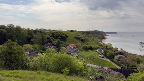 View over Kyrkbacken on the Swedish island Ven in the Oresund strait. Raw Footage.