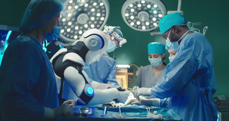 Robot and multiracial team of professional medical surgeons performs surgical operation in modern hospital. Doctors are working to save patient. Concept of future robotic surgery.